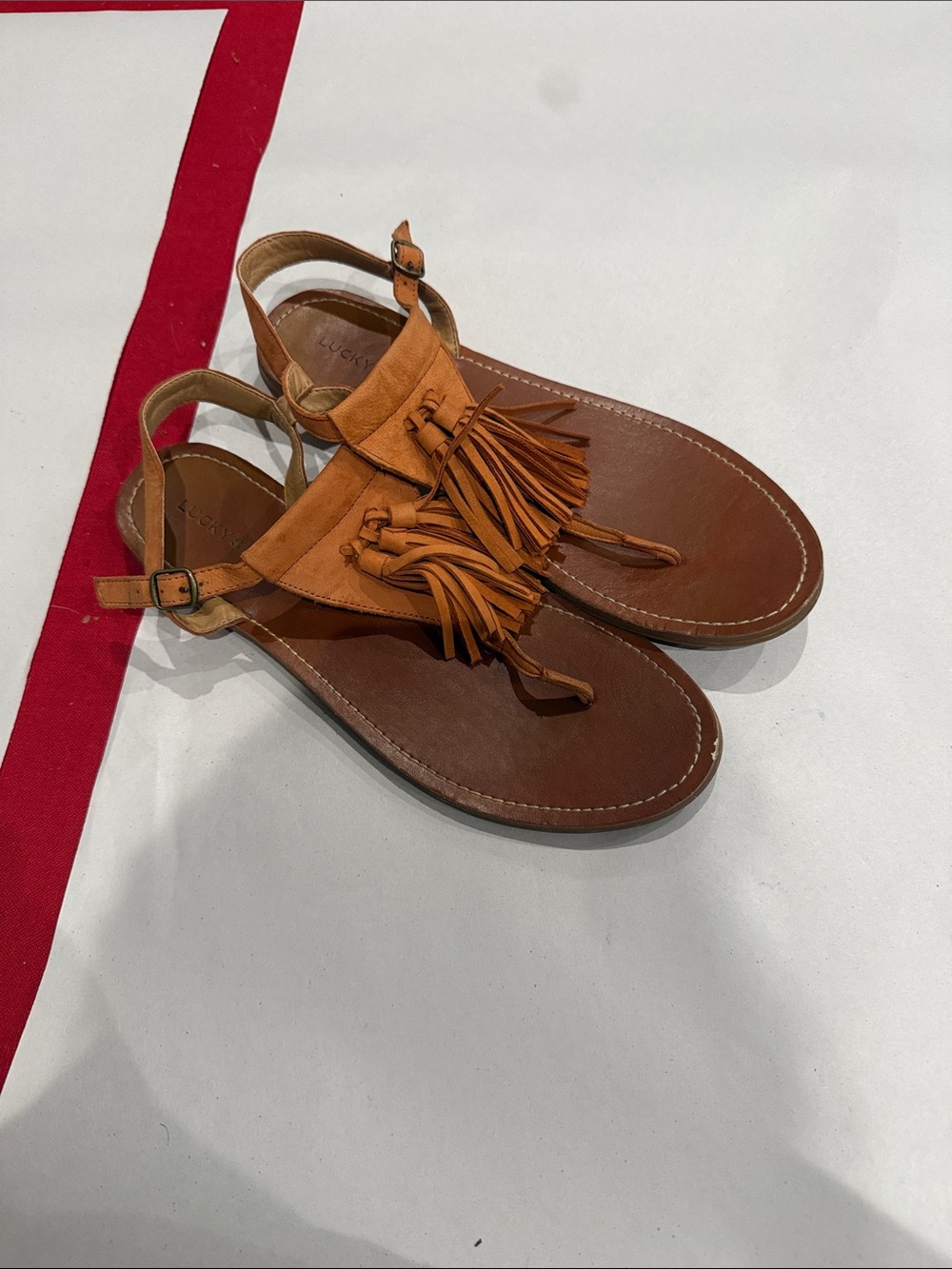 Lucky Brand Tan and orange Fringe T-Strap Sandals
